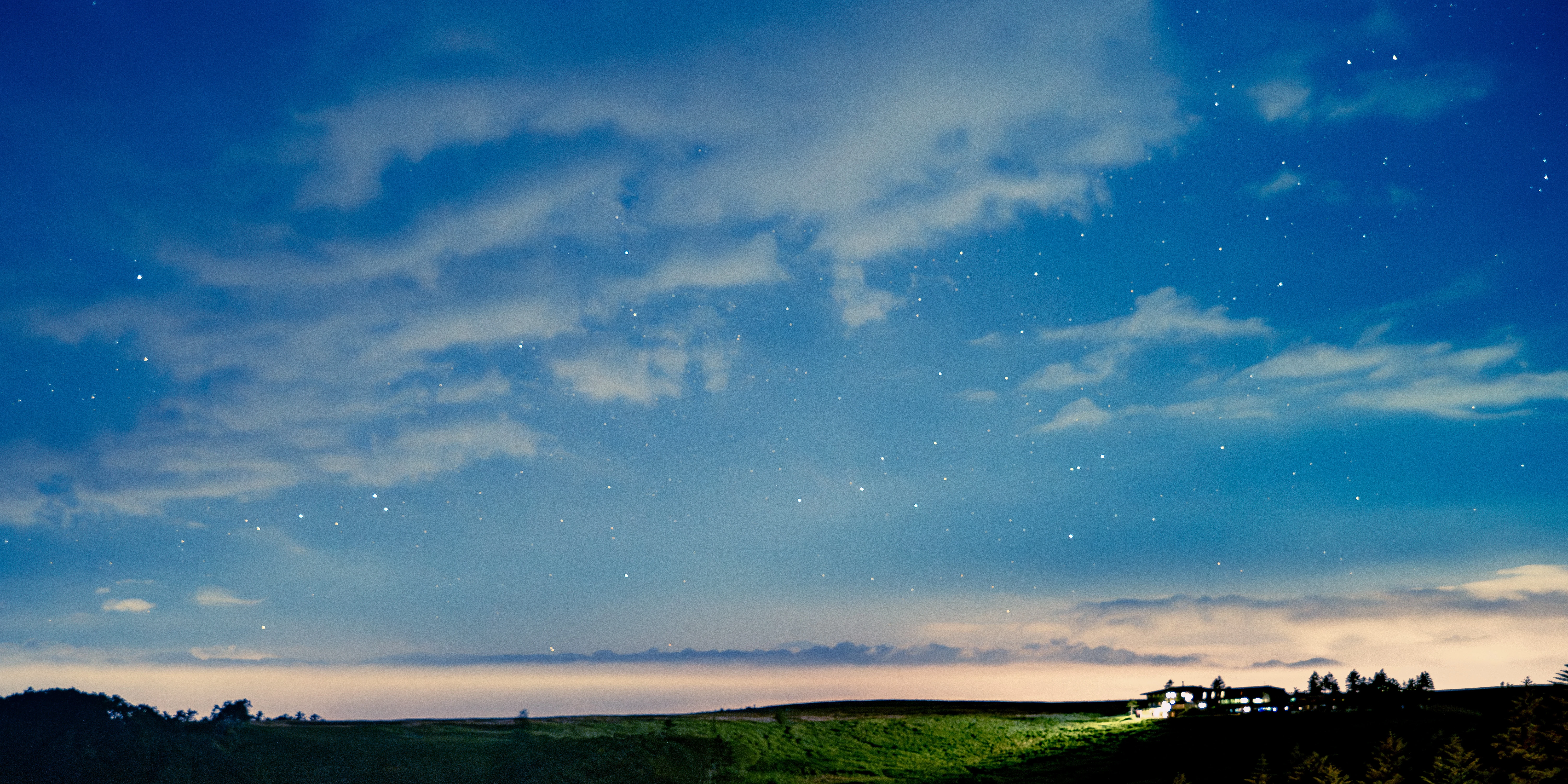 Starry Night Sky Over a Peaceful Countryside